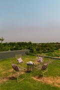Earthstone 4-BHK Stone-Clad Villa with Private Pool, Terrace Garden & Gazebo
