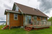 Two lakefront dog-friendly cabins on four acres with porches, dock, & lake views Two lakefront dog-friendly cabins on four acres with porches, dock, & lake views