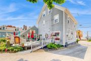 Nautical vacation rental in in walkable downtown with harbor view, grill & deck