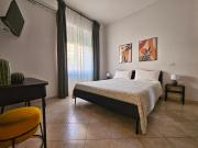 Casalú - Appartamento con Giardino Privato e Parcheggio Gratuito vicino Metro B