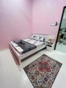 Top Tanah Merah
