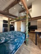 Studio atypique avec filet suspendu & mezzanine