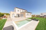 Summer Oasis by Belmont Realty