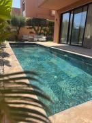 Villa design avec piscine chauffée, proche centre