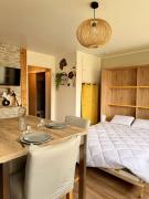 Studio neuf parking proche centre-ville