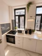 Boutique 1-Bedroom Apartment with Designer Accent