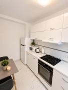 Cozy Bedroom Studio with Modern Kitchen & Bath