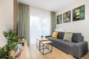 Stylish Apartment with Parking and Balcony by Noclegi Renters