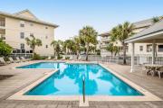 Sunny coastal condo with pool balcony & sound view - walk to the beach