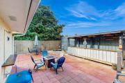 Gorgeous coastal home with outdoor dining-living space & close to beach