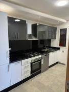 2BR Apartment with Pool & Secure Parking