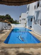 Appartement élégant avec piscine