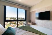 One-Bedroom with Balcony Near Malls Pool and City Views