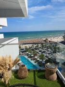 Zyra SeaSide Infinity Apartment