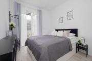 Stylish Apartment with Garden in Quiet Neighborhood by Noclegi Renters