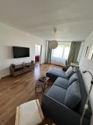 Tichý priestranný apartmán s parkovaním
