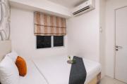 Exquisite 2BR Bassura City Apartment near Shopping Mall By Travelio