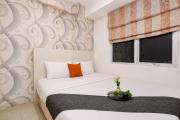 Exquisite 2BR Bassura City Apartment near Shopping Mall By Travelio