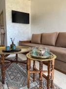 Appartement avec piscine en bord de mer