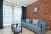 Stylish Apartment with Parking & Workspace Close to the City Centre by Noclegi Renters