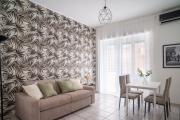 360 Mameli House - Appartamento con balcone a 10 minuti dalla metro