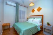 Pwani 2BR near Beach & City, AC, Pool & Fast WiFi
