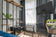 Lawendowa Old Town Signature Rooms with Shared Kitchen by Downtown Apartments
