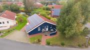 6 Personen Ferienhaus in direkter Seelage mit Bootsteg und Kanu sowie Sauna, Whirlpool und Kaminofen in Otterndorf