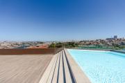 Premium Living with Pool, Balcony, Gym & Garage by HostWise