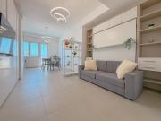 Bright Studio with AC and Balcony by Host Hero
