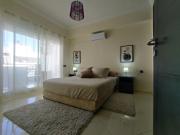 Appartement Élégant 2 Chambres, Balcon, Fibre, Climatiseur, IPTV & Parking privé à 5 min de la plage
