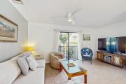 Charming condo with access to shared outdoor pool wifi & private balcony