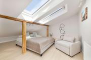 Klimatyzowany Apartament z 2 Sypialniami blisko Centrum by Noclegi Renters