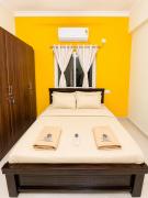 Yellow Delight 2BHK Themed flat near US Consulate