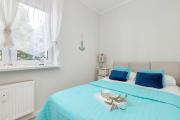 Bright Blue Apartment in Gdynia Close to the Park by Noclegi Renters