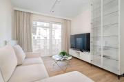 Spacious Apartment with a Balcony Close to the Airport by Noclegi Renters