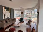 Exclusive, stylish, bright, and perfectly located!