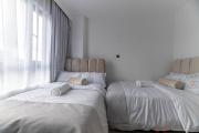 Elegant luxury three bedroom apartment with swimming pool fully equipped gym children playing ground ample parking space and amazing scenic view
