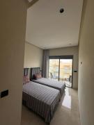 Beach Apartment with Pools, Gym & Parking - Beachland Residence
