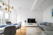 Wola Spacious Signature Apartment by BookingHost