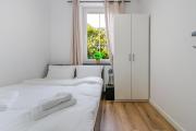 Krzywa Comfort Apartment by BookingHost