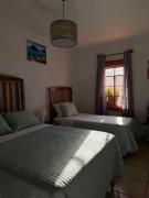 Habitaciónes en casa familiar
