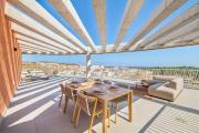 Family-friendly 2-bedroom penthouse with a padel court