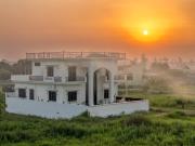 ELIVAAS Signature Mannat Villa 4-BHK English-Style Forest-View Villa with Covered Deck, Swing, Table Tennis & Lawn