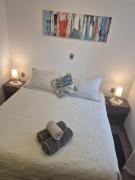 cama matrimonial con baño privado h1