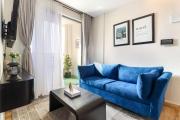 Blue Condo wit balcony, rooftop pool gym