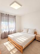 Sunny 2BR Apartment - 2nd Floor - Private Indoor Parking