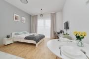 Modern Studio Slonimskiego with Balcony by Noclegi Renters