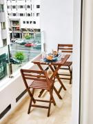 Racine studio élégant avec balcon vue imprenable sur la ville
