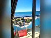 White and Blue Modern SeaView Studio
